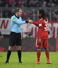 Fairplay Renato Sanches FC Bayern Munich and referee Marco Fritz shake hands for yellow-red card