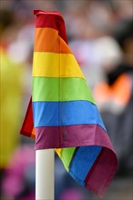 Corner flag in rainbow colours against exclusion for tolerance