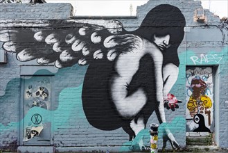 Graffiti depicting a fallen angel near Brick Lane