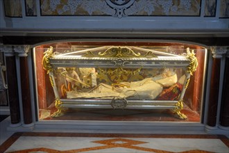 Holier Geminiano in a glass sarcophagus