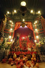 Altar with statues of gods Man and Mo