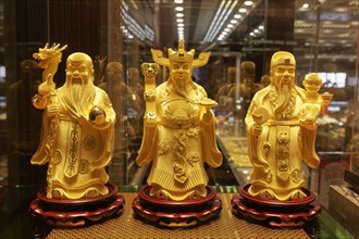 Daoist deities of pure gold in showcase
