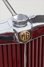 MG emblem on the radiator grill of a 1953 Model MG TD