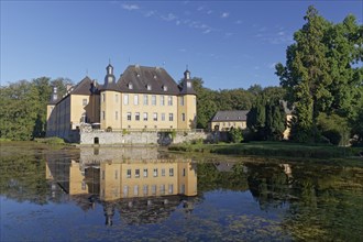 Schloss Dyck Castle with water reflection in moat