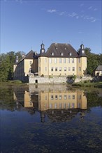 Schloss Dyck Castle with water reflection in moat