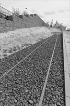 Railway tracks end in emptiness