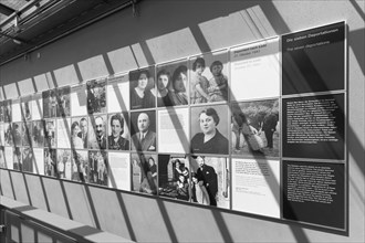 Picture wall with portraits of Jewish inhabitants