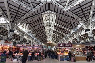 Market hall with people shopping