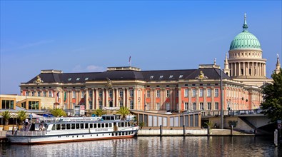 excursion boat in front of Parliament Potsdam and St. Nicholas Church