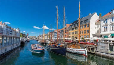 People in tourist boat in Nyhavn Canal