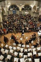 Church choir and orchestra at a concert in a church