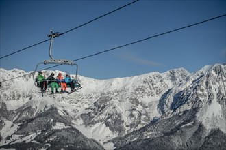 Skier in chair lift