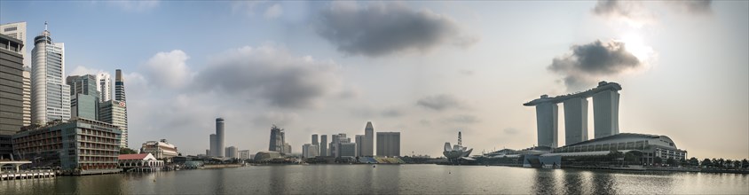 Marina Bay Sands Hotel and the financial district with skyscrapers and Esplanade Theatre