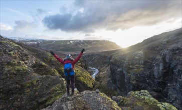 Hiker looking towards Canyon of Glymur