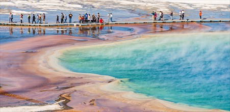 Tourists on a jetty in the thermal area