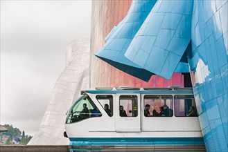 Monorail train runs through the Museum of Pop Culture