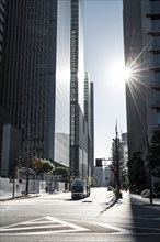 Traffic street in the city center with skyscrapers