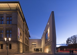 Old and new building of the Landesmuseum fur Kunst und Kultur during blue hour