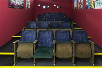 Reproduced cinema hall with seats from the 1970s