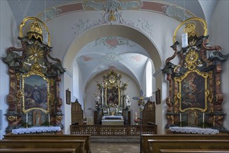 Altar and side altars of the late baroque St. Kunigunde church