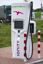 Charging station for e-cars at a parking lot
