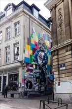 Manneken Pis Graffiti on house facade