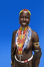 Woman with many pearl necklaces as necklace