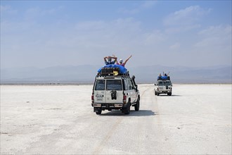 Jeep tour with tourists over Lake Karum