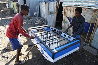 Children play table football in Mekele