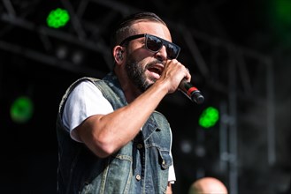 The swiss rapper and musician Marco Bliggensdorfer alias Bligg live at the 26th Heitere Open Air in Zofingen