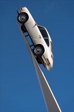 911 F-model from 1970 on a white pedestal