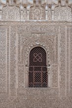 Wall with ornamental Moorish plaster decorations and Koransuren