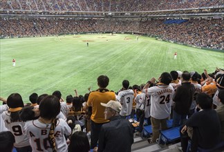 Supporters of Yomiuri Giants baseball team at Tokyo Dome stadium
