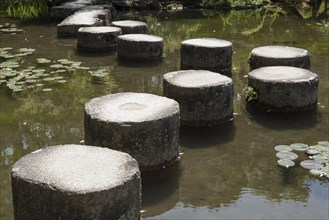 Stepping stones in pond at Heian Jingu gardens