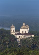 St. Cajetan Church among palm trees