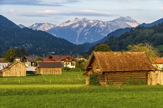 Wooden huts in front of Garmisch-Partenkirchen
