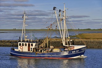 Fishing boat in Norddeich Mole channel