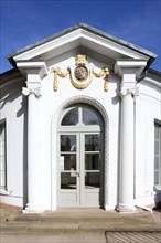 Entrance with coat of arms