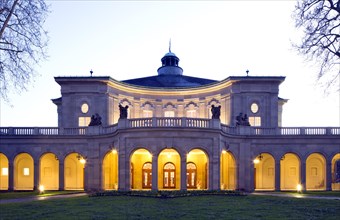 Illuminated Kursaal building or Regentenbau at dusk