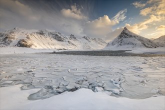 Frozen fjord at sunset
