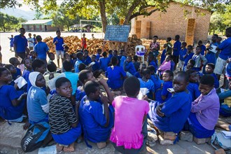 Primary school outside with many children