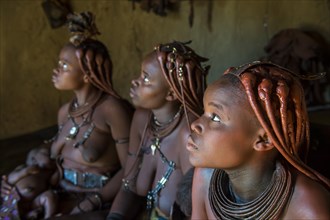 Himba women in their hut