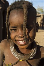 Laughing young Himba child