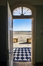 Looking through a doorinto the dessert