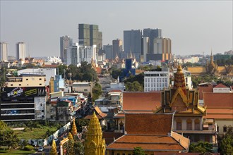 Panoramic view with Wat Ounalom and skyline from Koh Pich