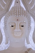 Buddha statue in the white prayer hall