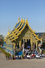 Tourists at the entrance of Wat Rong Seur Ten