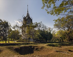 Mass graves in front of the Memorial Stupa