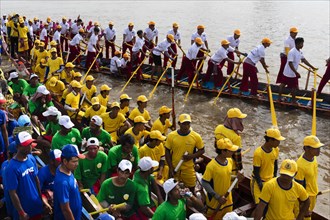 Many rowers in dragon boats at the Bon Om Touk Water Festival on the Tonle Sap River