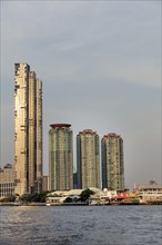 Four Seasons Private Residences and the three towers of the Chatrium Riverside Hotel Bangkok on the Chao Phraya River